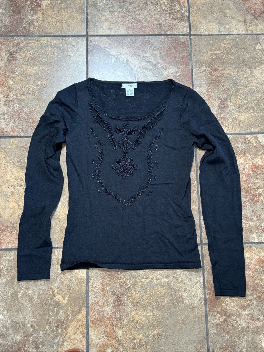 Cache 90’s black long sleeve top with embroidered open floral design